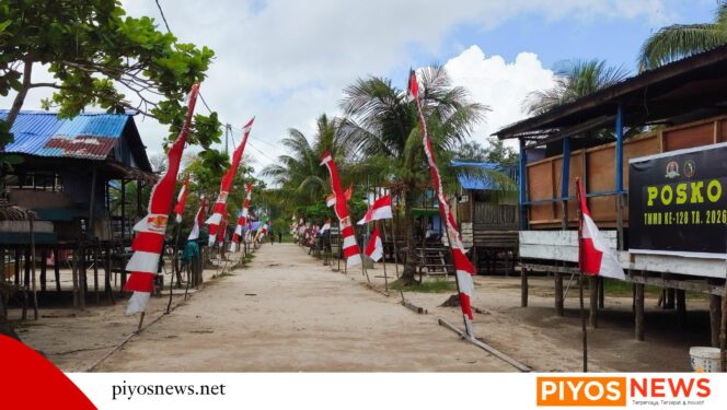 
					Semarak Jelang Wasev TMMD, Satgas dan Warga Percantik Kampung Keakwa dengan Umbul-Umbul